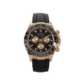 Rolex Cosmograph Daytona with a black dial and a matching black rubber strap 40mm