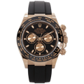 Rolex Cosmograph Daytona with a black dial and a matching black rubber strap 40mm
